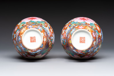 A pair of Chinese famille rose 'Millefleur' vases, Qianlong mark, Republic