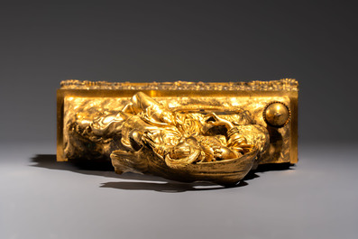 A gilt-bronze 'Oriental Beauty Reclining on a Lion Skin' mantel clock, France, first quarter 19th C.