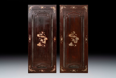 A pair of Vietnamese mother-of-pearl-inlaid hardwood 'Dragon and Carps' panels, 19th C.