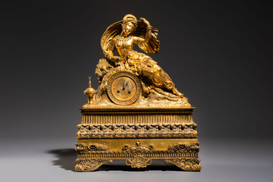 A gilt-bronze 'Oriental Beauty Reclining on a Lion Skin' mantel clock, France, first quarter 19th C.