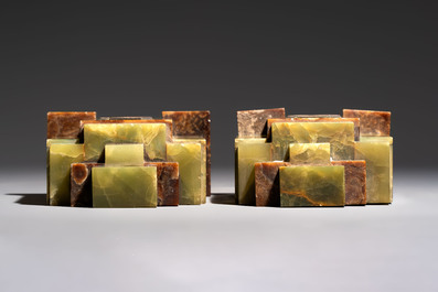 Georges Lavroff (1895&ndash;1991): An Art Deco three-piece copper-alloy-mounted green and brown onyx mantelpiece garniture, ca. 1900