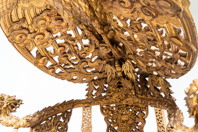 An exceptional Vietnamese gilt-lacquered wood and ivory 'Dragon and Phoenix' throne-shaped altar, 18/19th C.