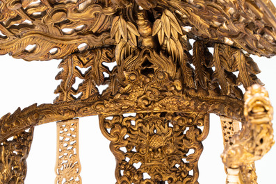An exceptional Vietnamese gilt-lacquered wood and ivory 'Dragon and Phoenix' throne-shaped altar, 18/19th C.