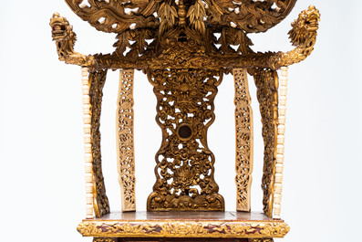 An exceptional Vietnamese gilt-lacquered wood and ivory 'Dragon and Phoenix' throne-shaped altar, 18/19th C.