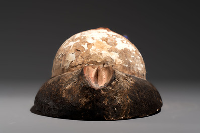 A polychromed wooden fertility belly mask from the Yoruba people, West Africa, 20th C.