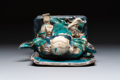 A Chinese fahua-glazed biscuit figure of Zhenwu, Ming