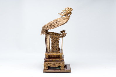 An exceptional Vietnamese gilt-lacquered wood and ivory 'Dragon and Phoenix' throne-shaped altar, 18/19th C.