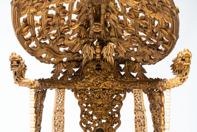 An exceptional Vietnamese gilt-lacquered wood and ivory 'Dragon and Phoenix' throne-shaped altar, 18/19th C.