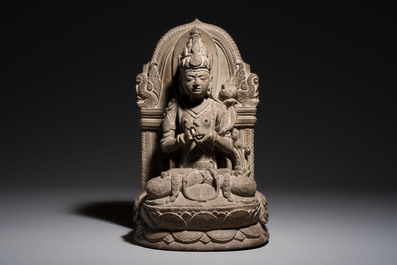 A Javanese carved stone figure of Prajnaparamita, 20th C.