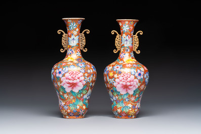 A pair of Chinese famille rose 'Millefleur' vases, Qianlong mark, Republic