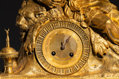 A gilt-bronze 'Oriental Beauty Reclining on a Lion Skin' mantel clock, France, first quarter 19th C.
