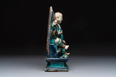 A Chinese fahua-glazed biscuit figure of Zhenwu, Ming