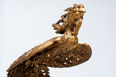 An exceptional Vietnamese gilt-lacquered wood and ivory 'Dragon and Phoenix' throne-shaped altar, 18/19th C.