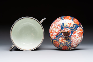 Two Japanese Imari covered bowls, one mounted in silver and wood and the other with gilt-bronze mounts, Meiji, 19th C.