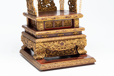 An exceptional Vietnamese gilt-lacquered wood and ivory 'Dragon and Phoenix' throne-shaped altar, 18/19th C.