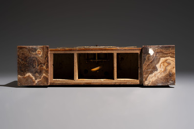 Georges Lavroff (1895&ndash;1991): An Art Deco three-piece copper-alloy-mounted green and brown onyx mantelpiece garniture, ca. 1900