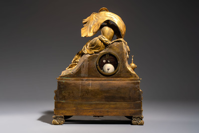 A gilt-bronze 'Oriental Beauty Reclining on a Lion Skin' mantel clock, France, first quarter 19th C.