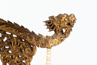 An exceptional Vietnamese gilt-lacquered wood and ivory 'Dragon and Phoenix' throne-shaped altar, 18/19th C.