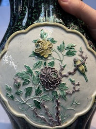 A Chinese verte biscuit black-ground vase and a covered jar, Xuande and Kangxi mark, 19th C.