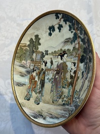 A Japanese Satsuma plate and a vase with figural design, Kozan 光山 and Ryokuzan 祿山 mark, Meiji, 19th C.