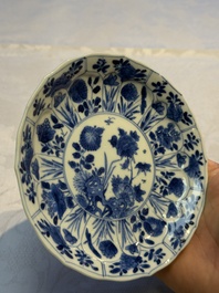 Nine Chinese blue and white cups and 12 saucers, Kangxi