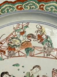 A Chinese famille verte 'Elegant Ladies and Playing Boys' dish, Chenghua mark, Kangxi