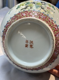 A Chinese famille rose 'Flowers and Fruits' bottle vase, Hongxian mark, Republic