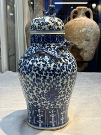 Three Chinese blue and white vases, one covered, Kangxi mark, 19th C. and later