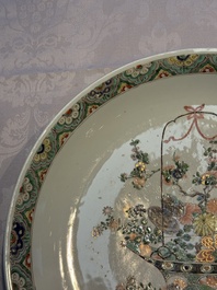 A Chinese famille verte 'Flower Basket' dish, lozenge mark, Kangxi