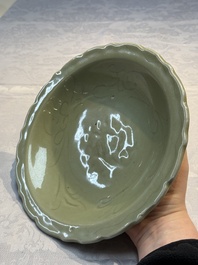 A Chinese Longquan celadon plate with incised floral design, Ming