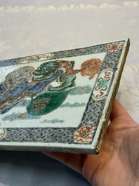 A Chinese famille verte 'Buddhist Lions' plaque, 19th C.