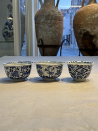 Nine Chinese blue and white cups and 12 saucers, Kangxi