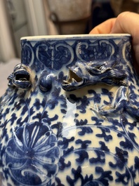 Three Chinese blue and white vases, one covered, Kangxi mark, 19th C. and later