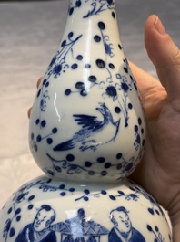 Three Chinese blue and white vases, one covered, Kangxi mark, 19th C. and later