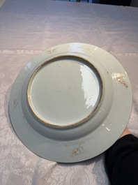 Four Chinese famille rose plates and a dish with floral design, Yongzheng/Qianlong