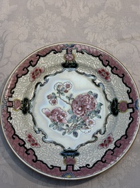 Four Chinese famille rose plates and a dish with floral design, Yongzheng/Qianlong