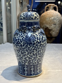 Three Chinese blue and white vases, one covered, Kangxi mark, 19th C. and later