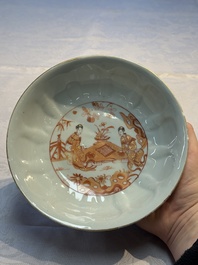 A pair of Chinese  iron-red and gilt-decorated 'Elegant Ladies and Tulips' bowls and covers, Kangxi
