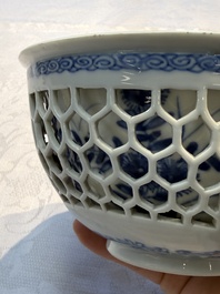 A Chinese blue and white reticulated double-walled 'Swastika' bowl, Kangxi