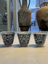 Nine Chinese blue and white cups and 12 saucers, Kangxi