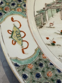 A Chinese famille verte 'Pavilions and Lotus Pond' dish, swastika mark, Kangxi