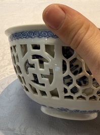 A Chinese blue and white reticulated double-walled 'Swastika' bowl, Kangxi