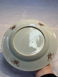Four Chinese famille rose plates and a dish with floral design, Yongzheng/Qianlong