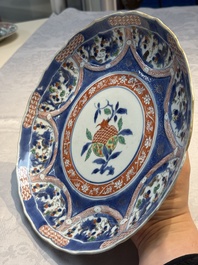 A Chinese famille verte blue-ground 'Pomegranate' dish, Kangxi