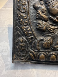 Three Tibetan copper repouss&eacute; plaques with Buddhist subjects, 19th C.