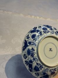 Nine Chinese blue and white cups and 12 saucers, Kangxi
