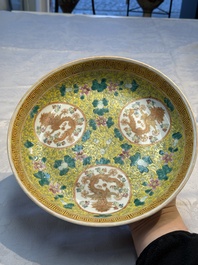 A Chinese famille rose 'Millefleurs' plate, a 'Dragons' plate, and a Nanking famille verte caf&eacute;-au-lait-ground bowl, Qianlong marks, 19/20th C.