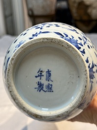 Three Chinese blue and white vases, one covered, Kangxi mark, 19th C. and later