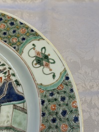 A Chinese famille verte 'Pavilions and Lotus Pond' dish, swastika mark, Kangxi