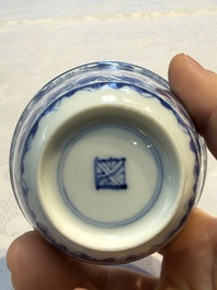 Nine Chinese blue and white cups and 12 saucers, Kangxi